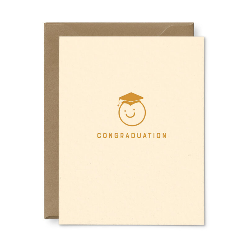 graduation card with smiley face and graduation cap. Saffron design says Congraduation