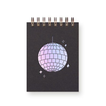 A black miniature notebook with an iridescent foil disco ball on it