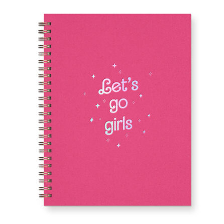 A hot pink journal with an iridescent foil design that says "Let's go girls" with surrounding sparkles