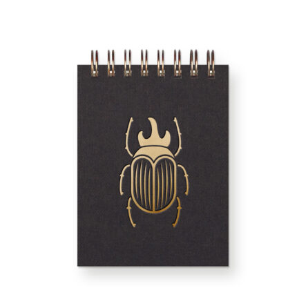 Nature inspired pocket-sized notebook with gold foil beetle on cover.