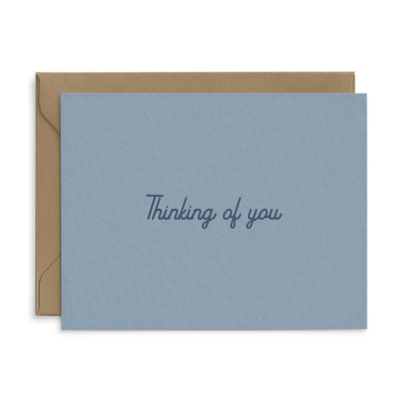 Sympathy greeting card that reads "thinking of you" in script font